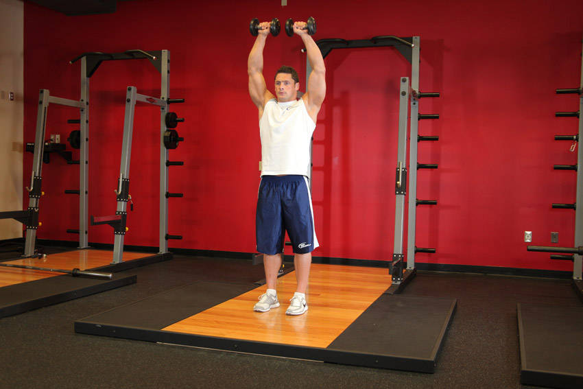 Standing Dumbbell Straight-Arm Front Delt Raise Above Head - Bitiş Pozisyonu
